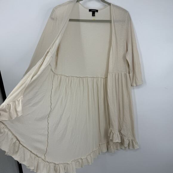 Torrid Cream Ruffle Hem Blouse - Picture 4 of 8